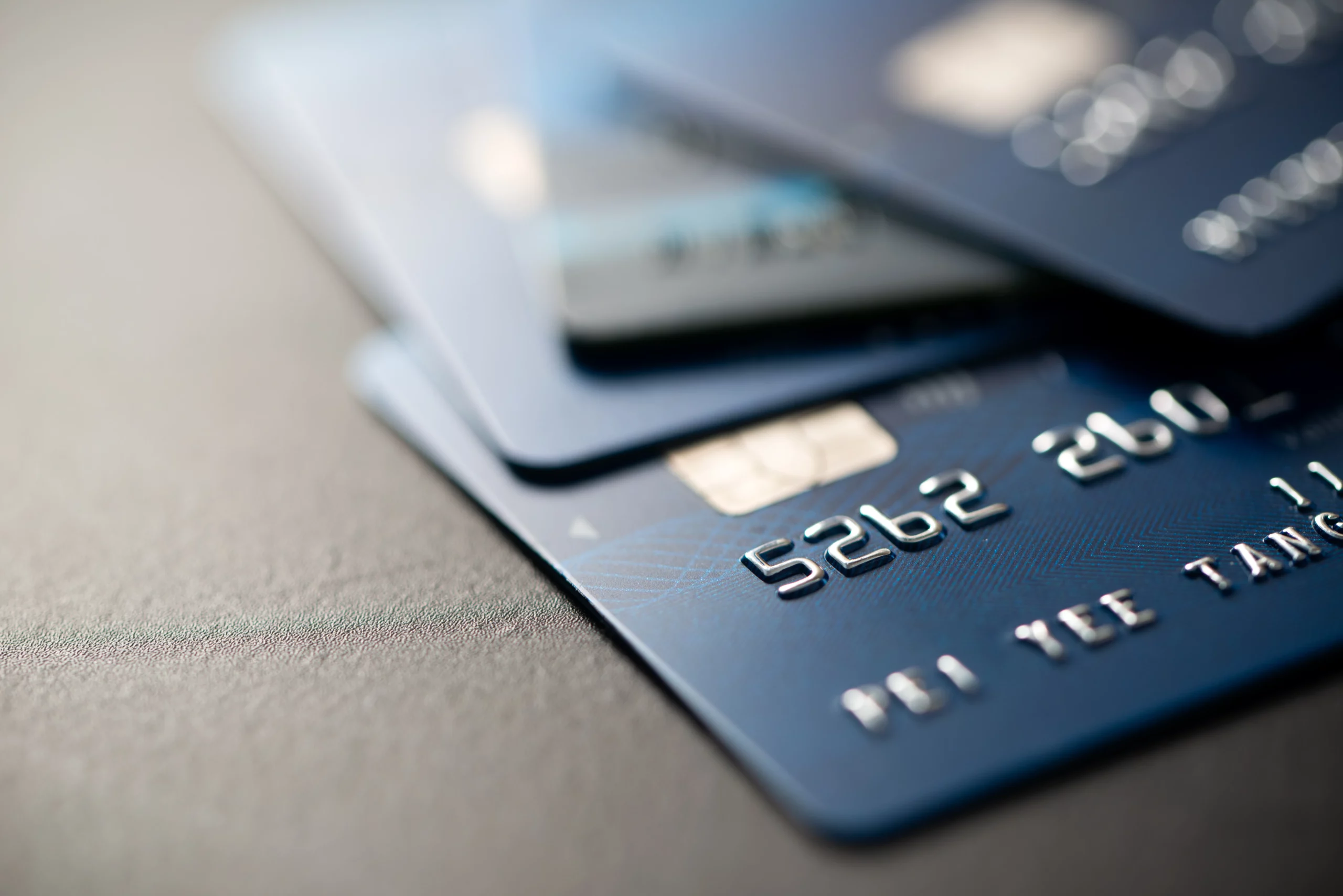 Close-up of blue credit cards illustrating PayPal Credit and credit card debt in bankruptcy.